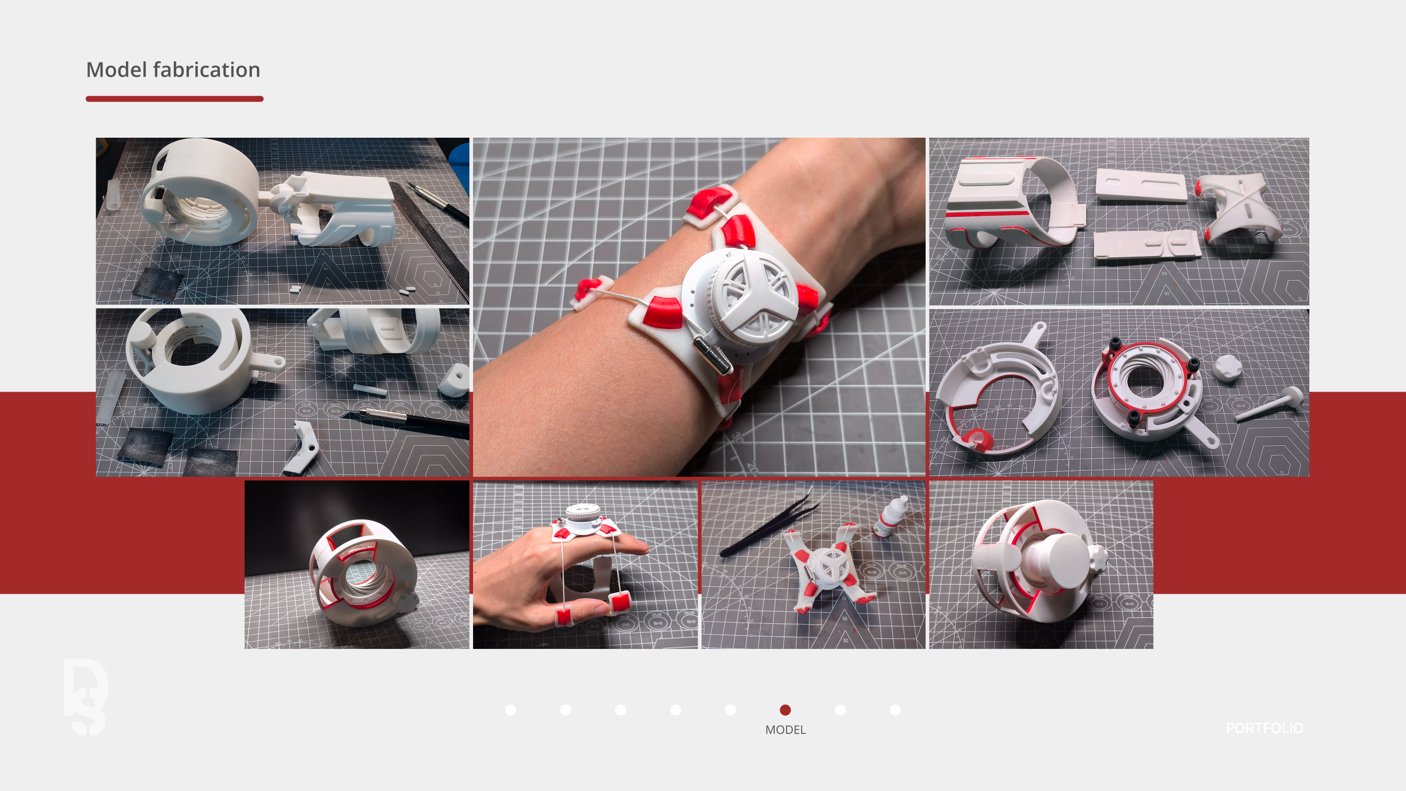 Model fabrication board showing the prosthetic hand being built and assembled.